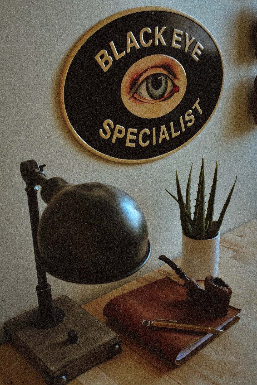 Black Eye Specialist Metal Sign