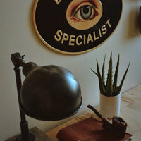 Black Eye Specialist Metal Sign