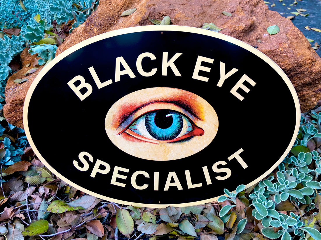Black Eye Specialist Metal Sign